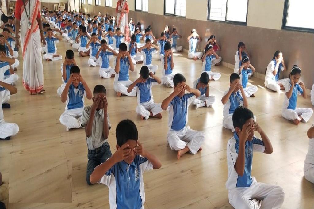 Students in meditation session at Atma Malik Campus